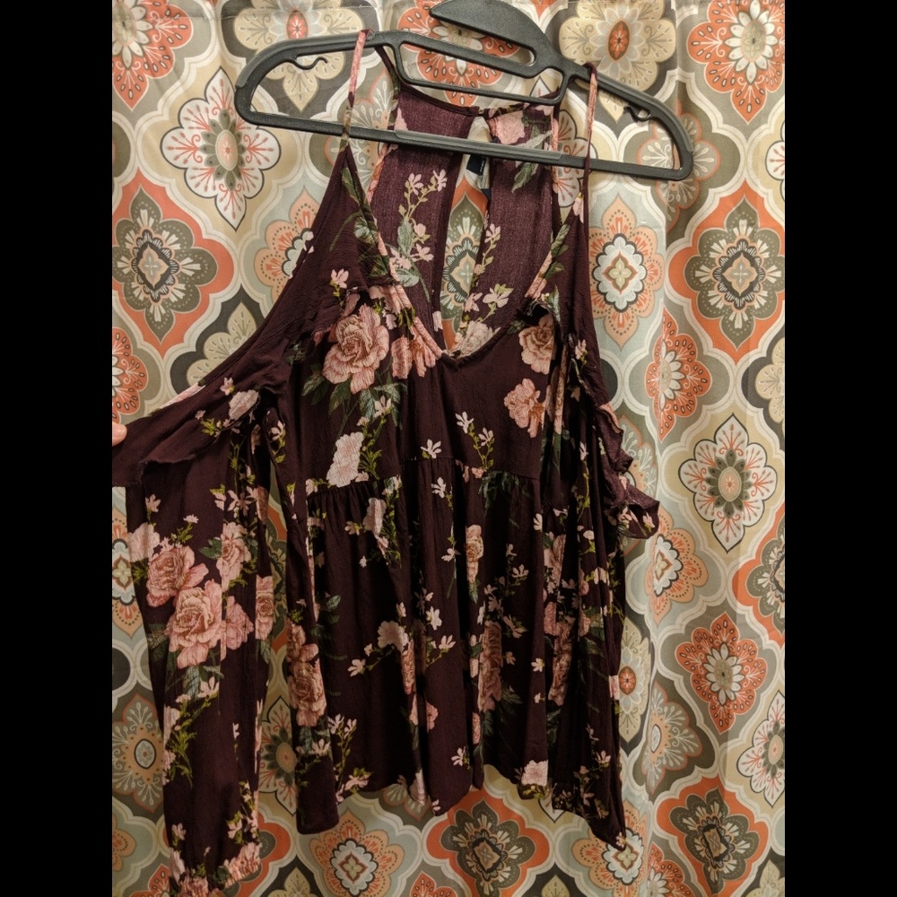 Opened shoulder shirt